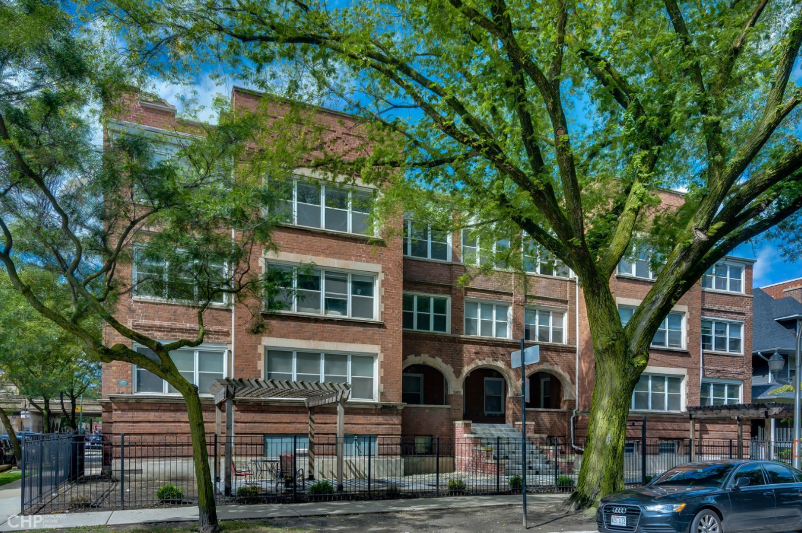 a front view of a building with street view