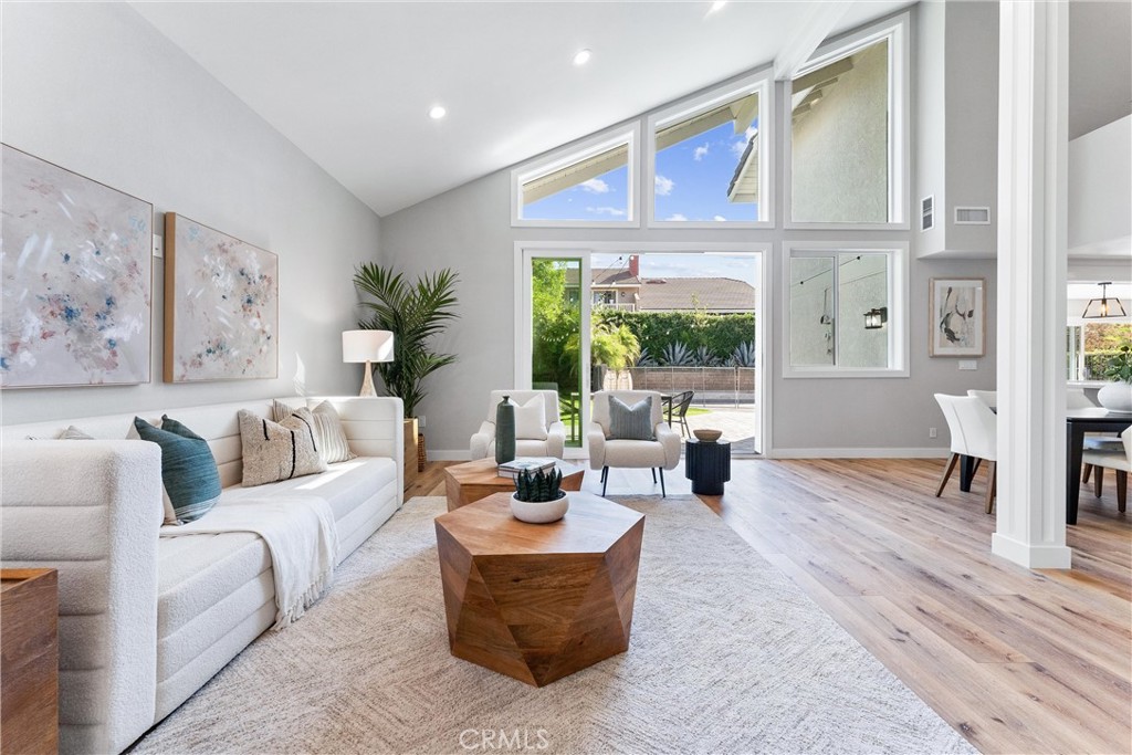 LIVING ROOM WITH VAULTED CEILINGS