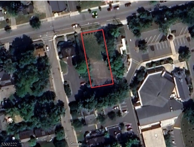 an aerial view of residential house with outdoor space and swimming pool