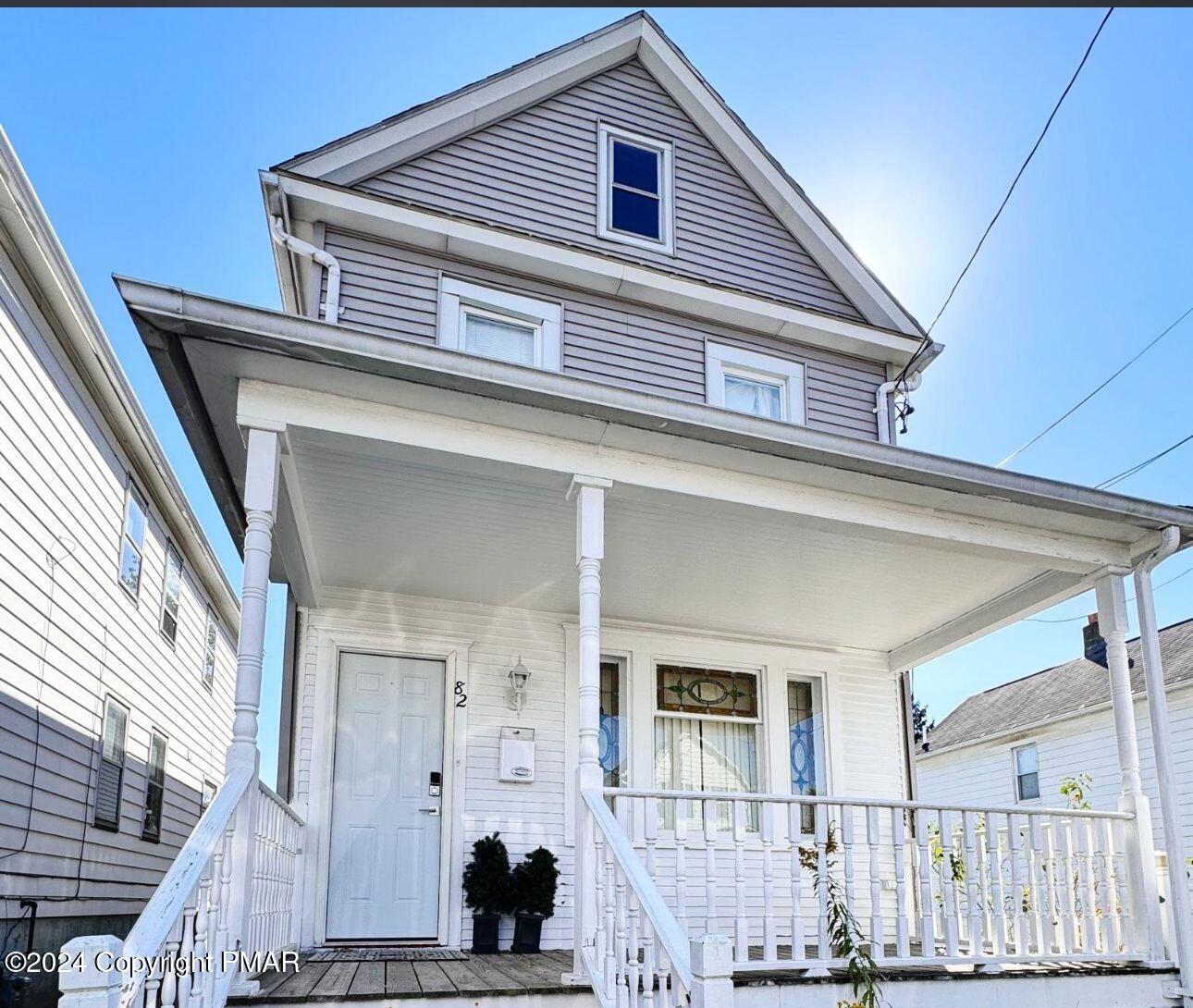 a view of a house with a iron stairs