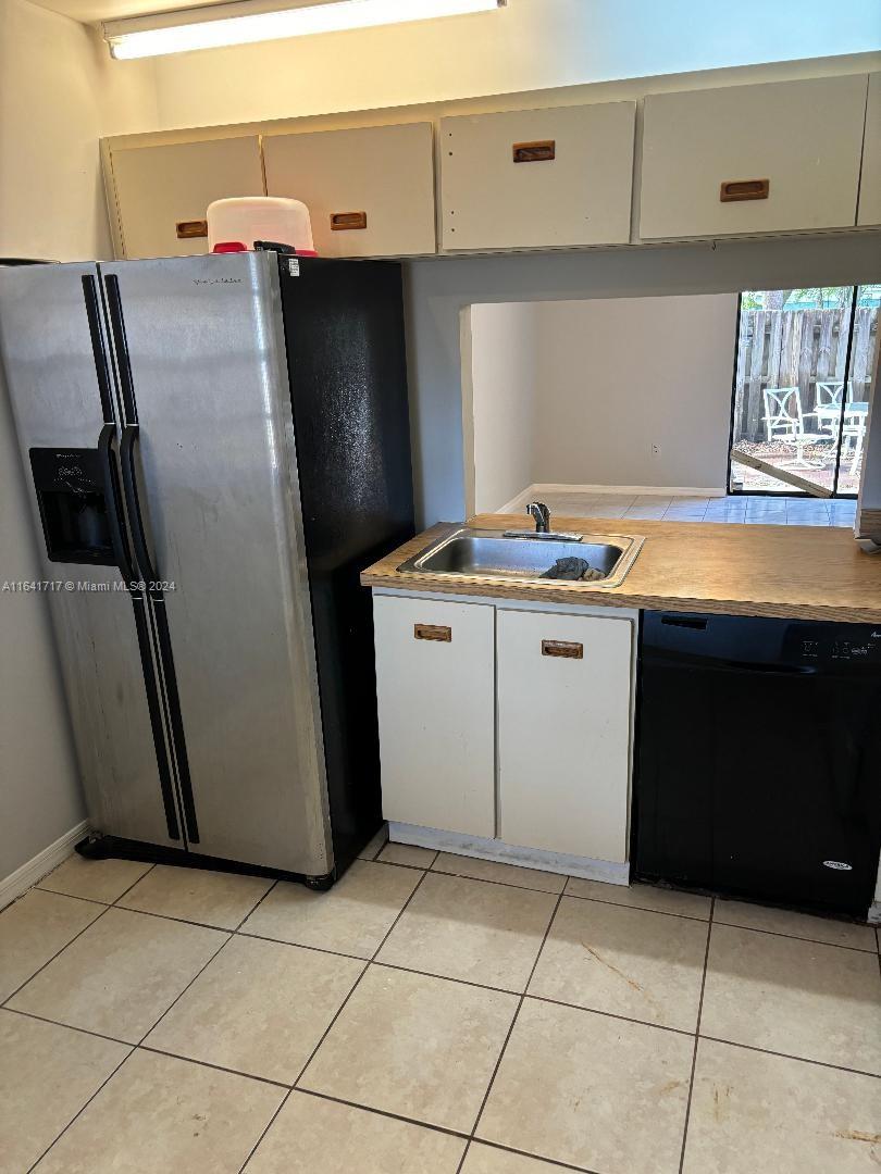 a utility room with washer and dryer