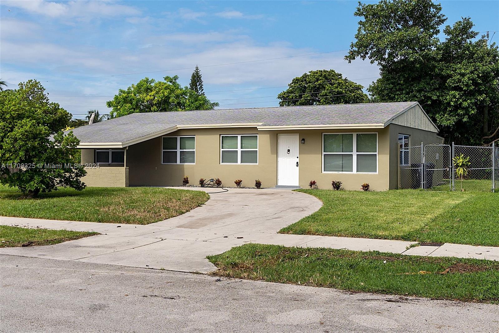 front view of house with a yard