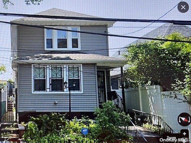 a view of a house with a garage