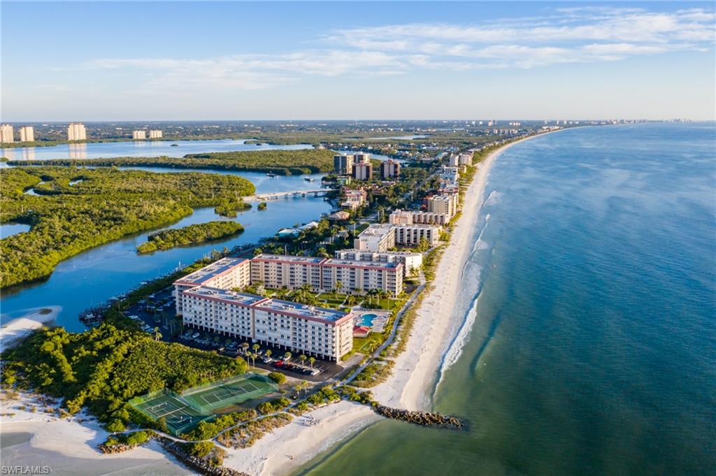 Pre-Hurricanes: Aerial view with a water view and a view of the beach