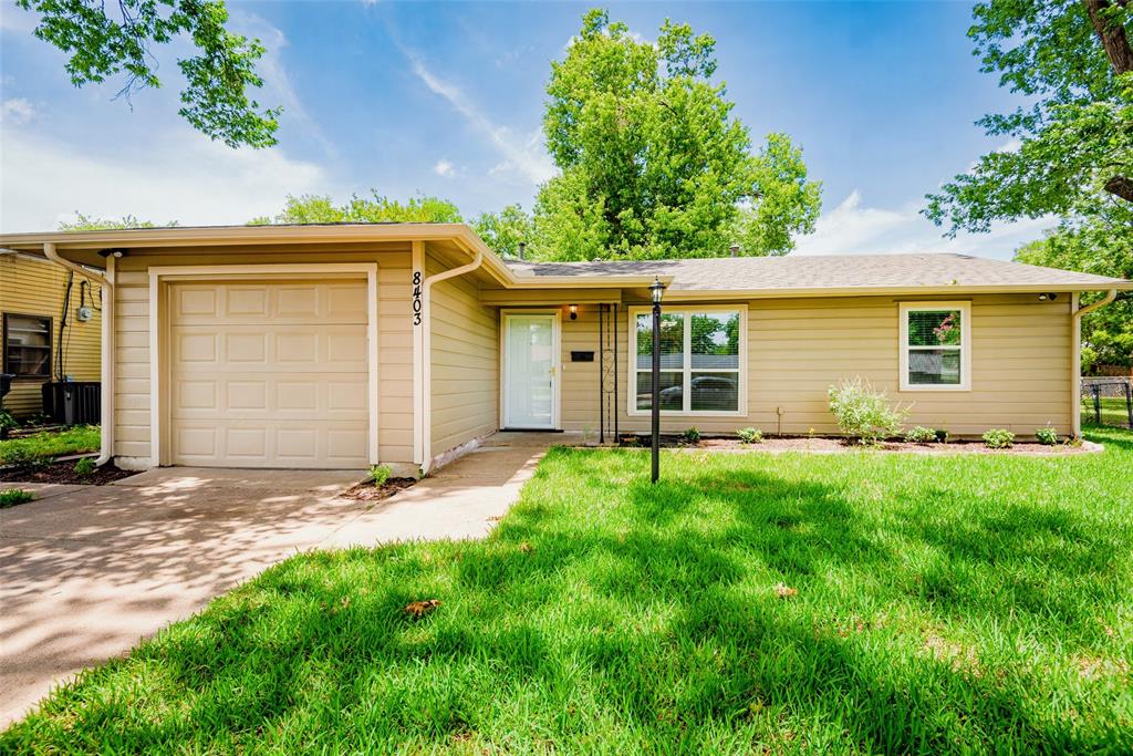 front view of house with a yard