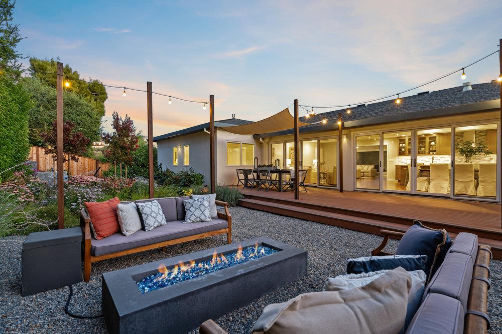 a outdoor living space with furniture and a potted plant