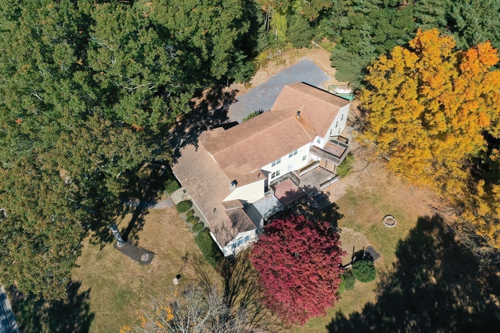 an aerial view of residential house with outdoor space