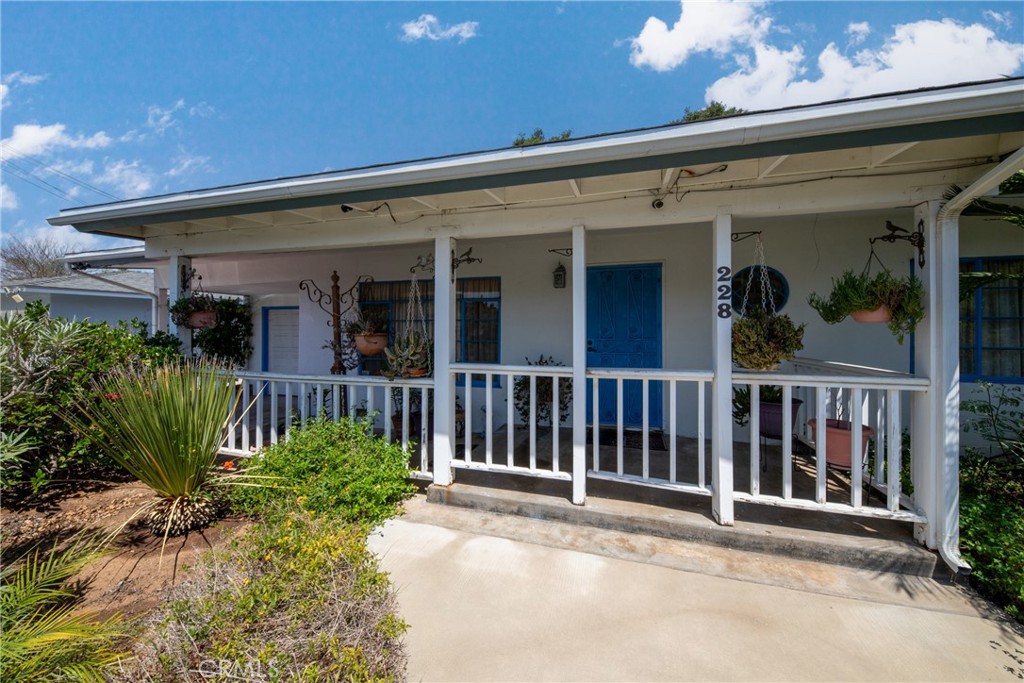 a view of a house with a porch