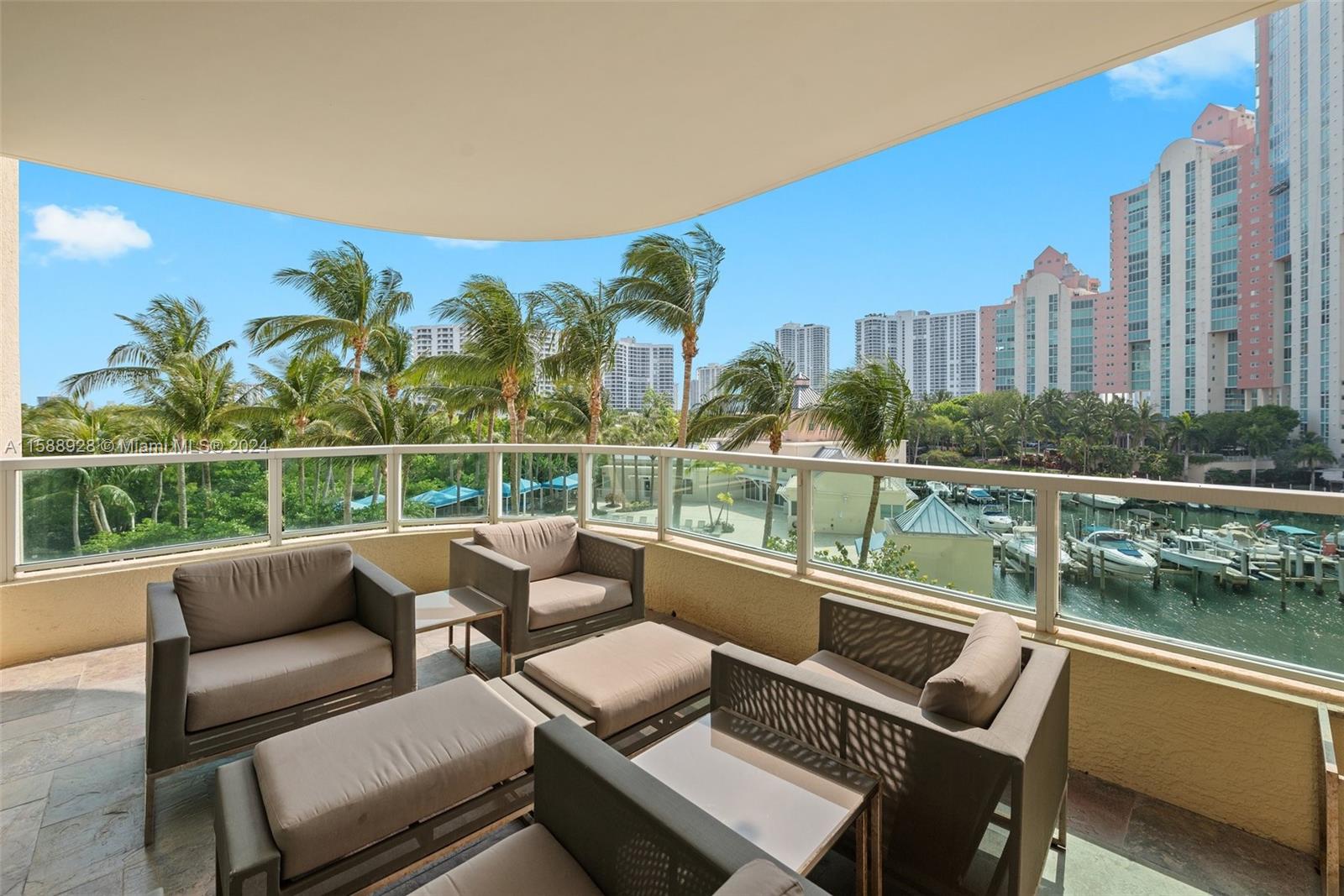 a view of a balcony with furniture