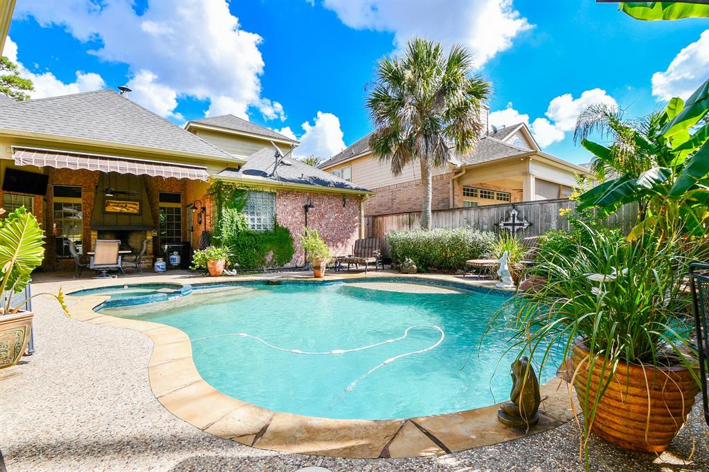 a view of a house with swimming pool