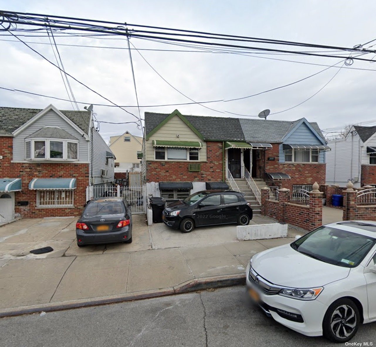 a car parked in front of a house