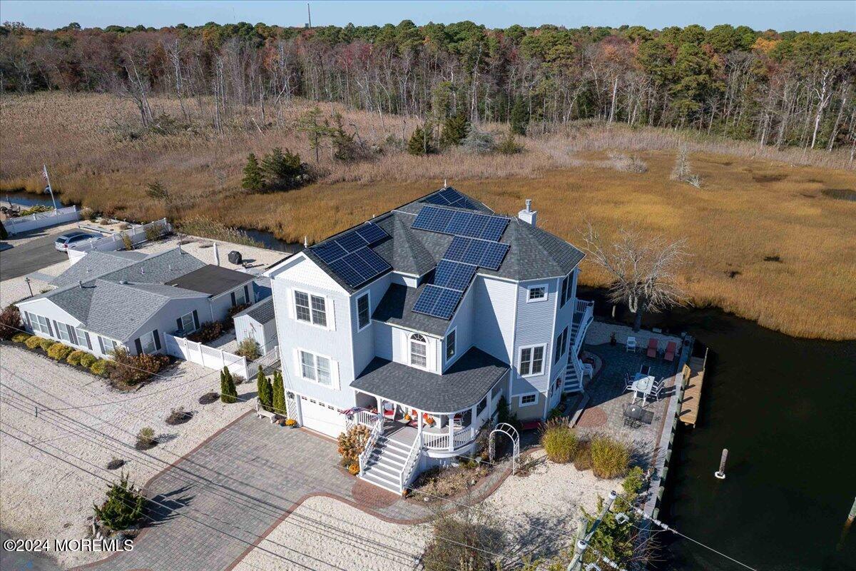 an aerial view of a house with garden