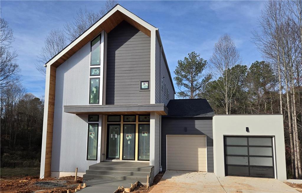 a front view of a house with a garage