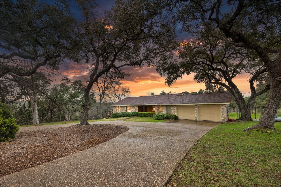 a view of house with outdoor space and street view