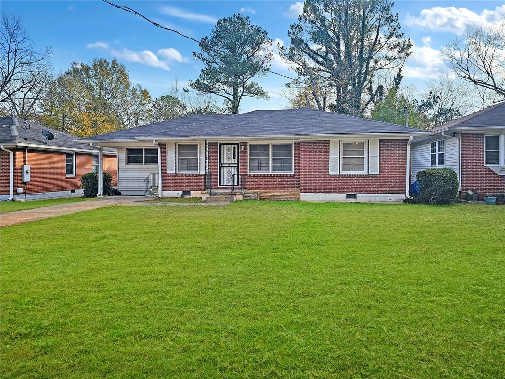 front view of a house with a yard