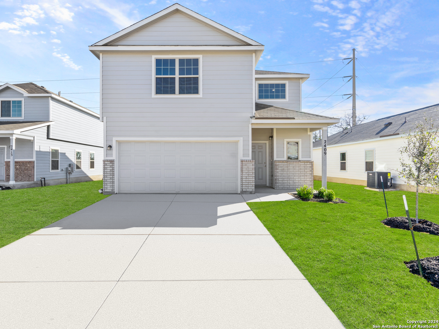 a front view of house with yard