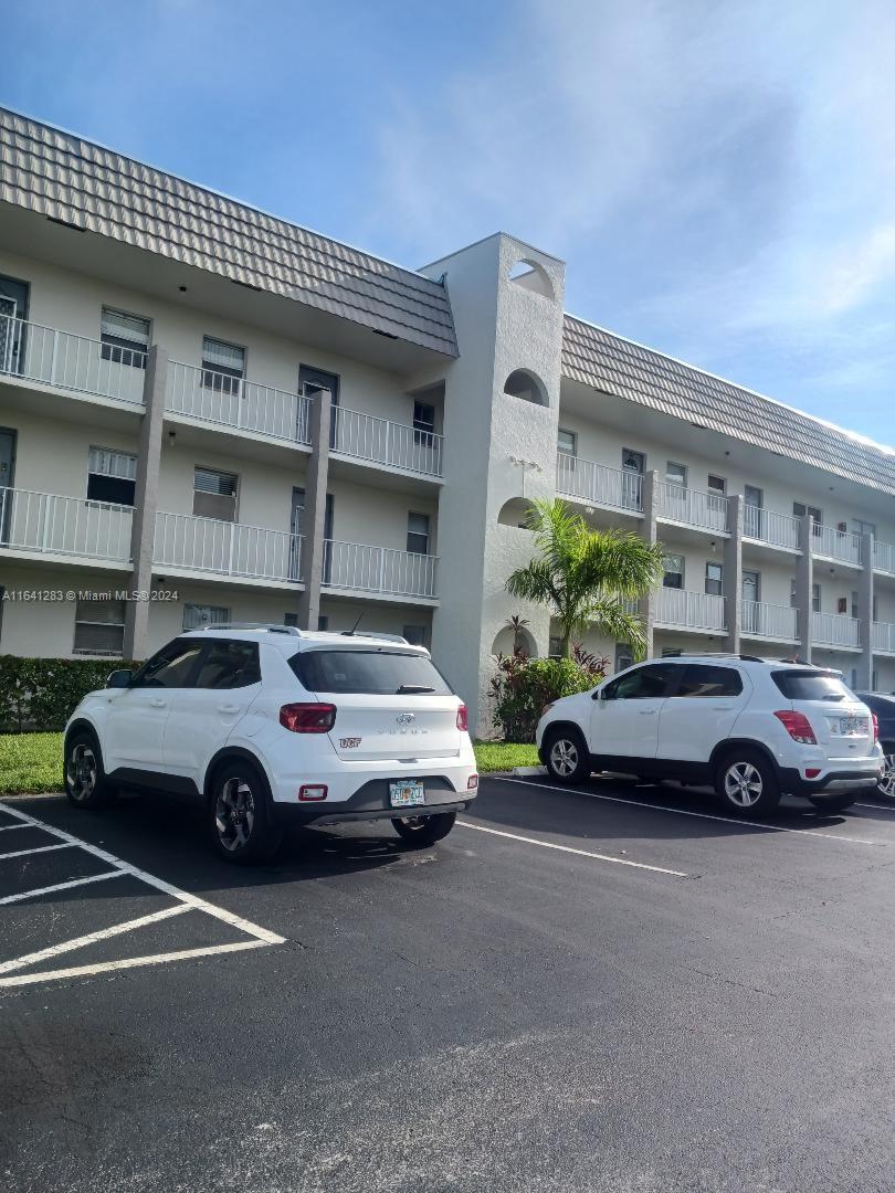 a car parked in front of a building