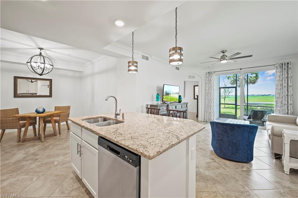 a kitchen with a table and chairs in it