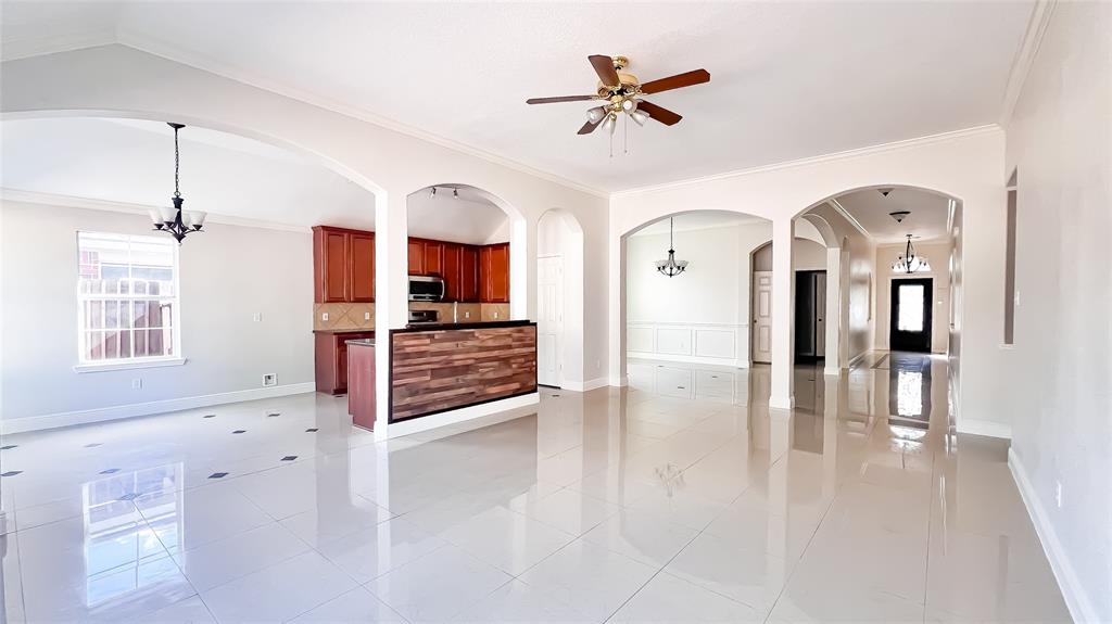 a view of livingroom with hardwood floor and a ceiling fan