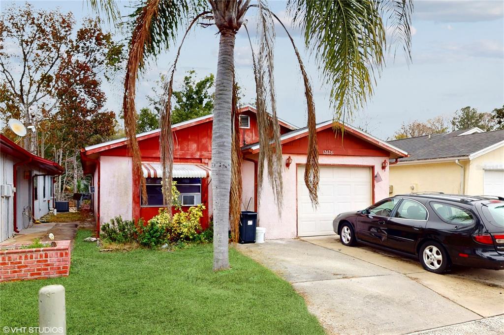 a car parked in front of a house