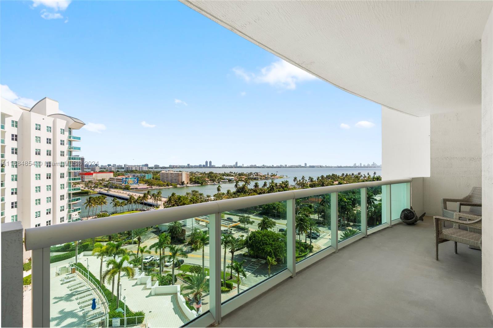 a view of balcony with furniture