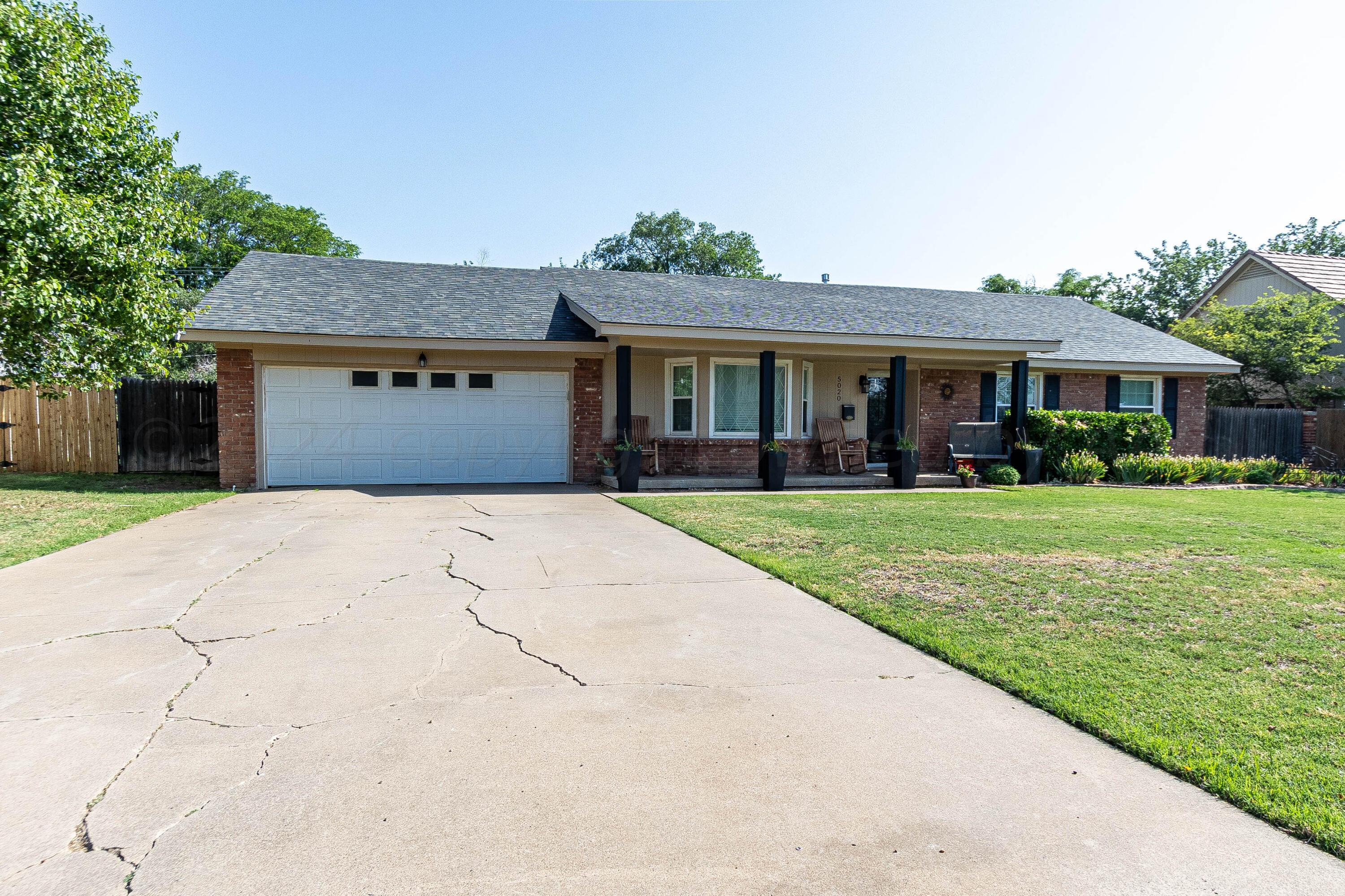 a front view of house with yard