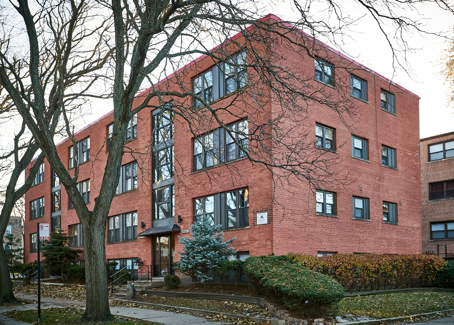 a view of a building with a yard