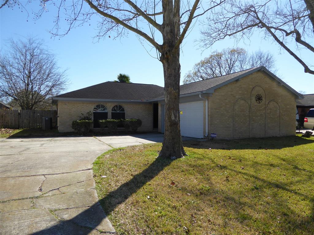 a house with trees in the background