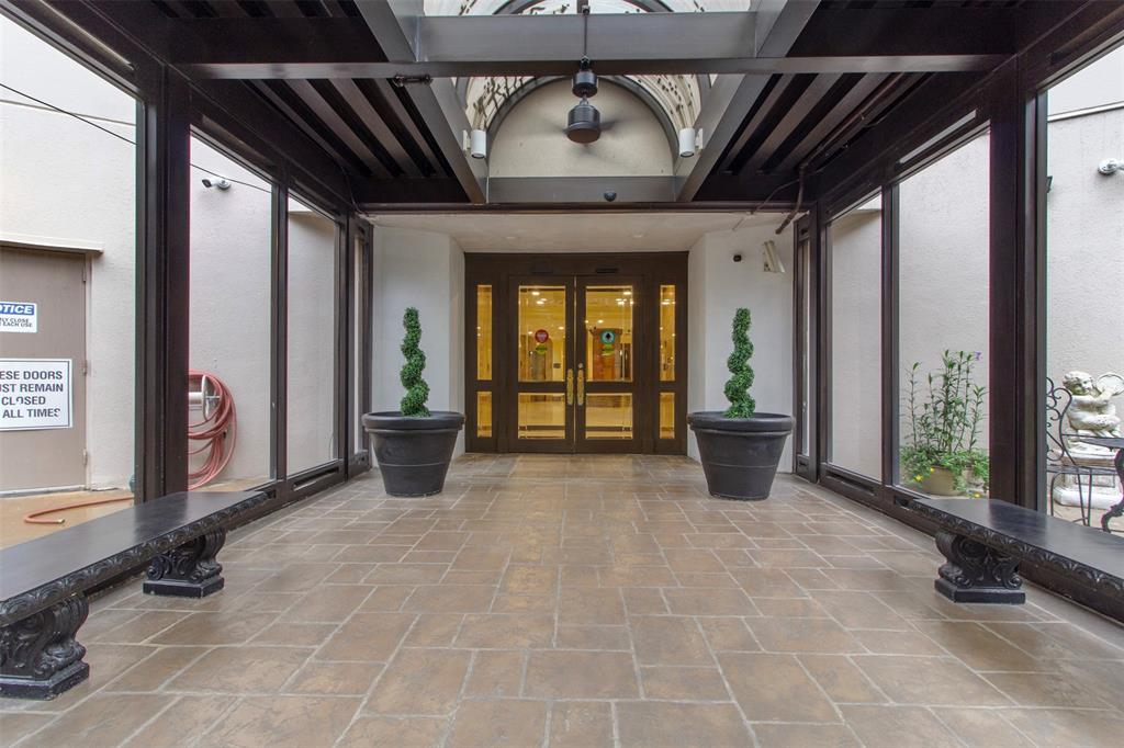 a view of an entryway with a floor to ceiling window