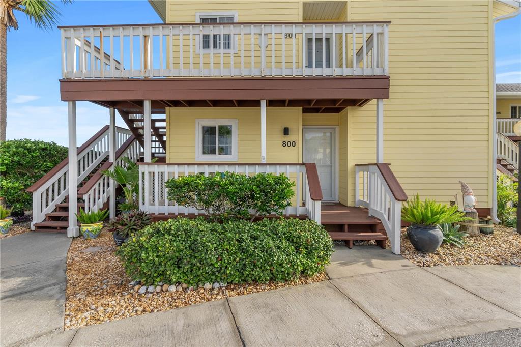 a front view of a house with porch