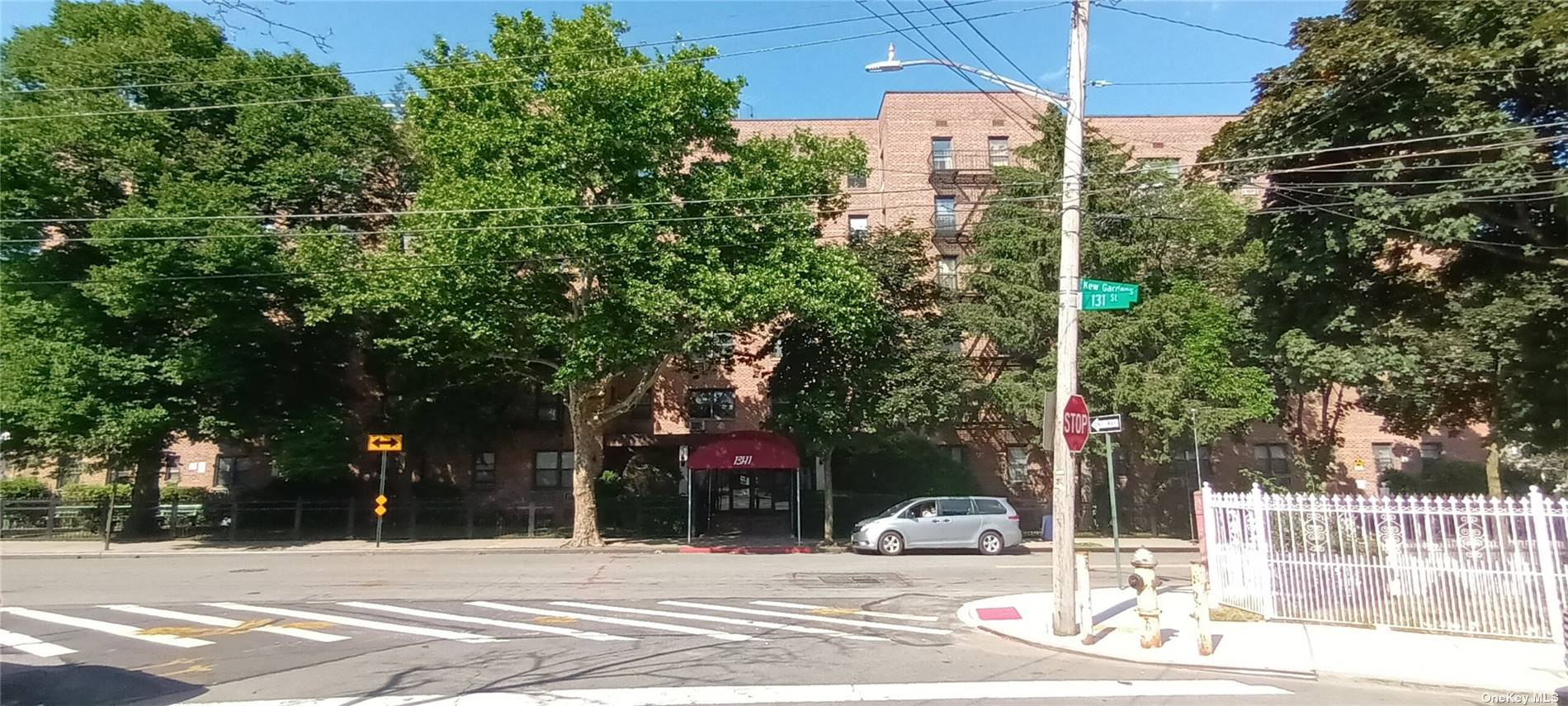 a outdoor view of a building with traffic signal lights