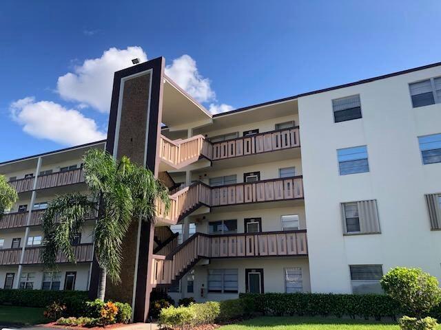 a front view of a building with balcony