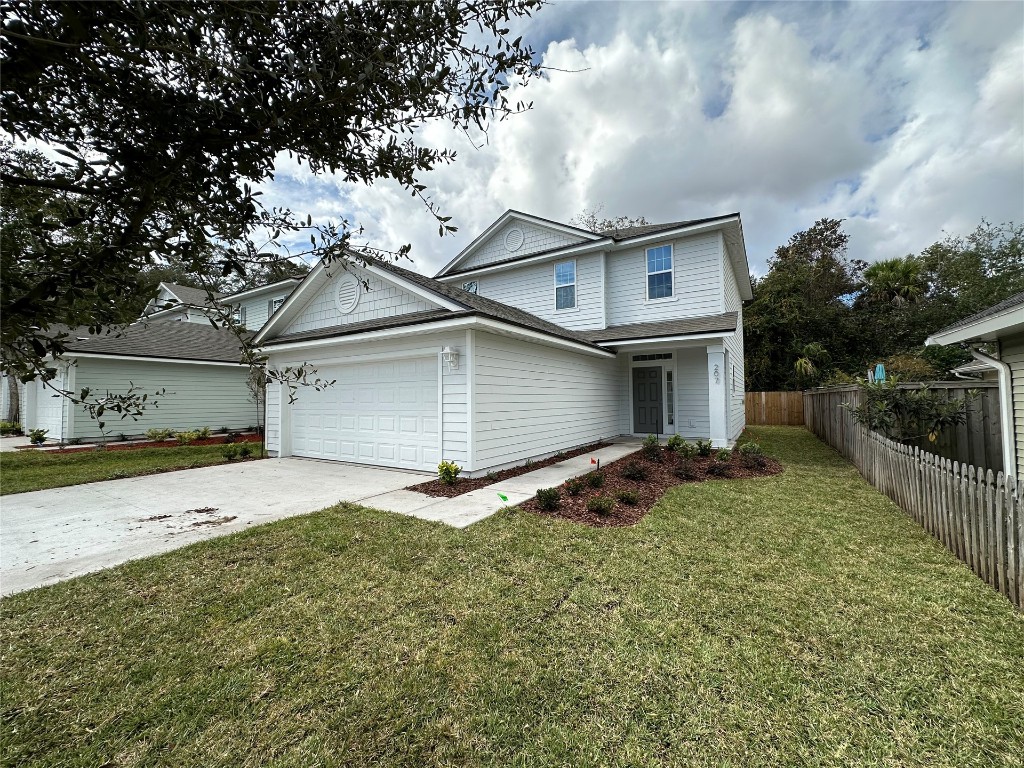 a view of a house with a yard