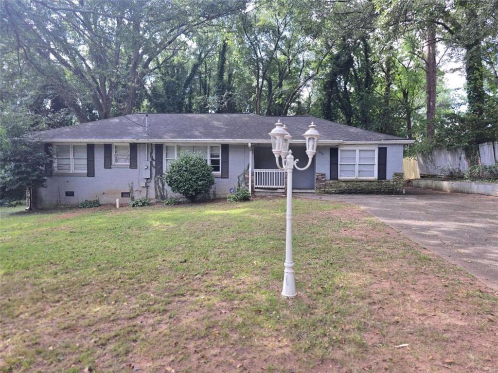 front view of a house with a yard