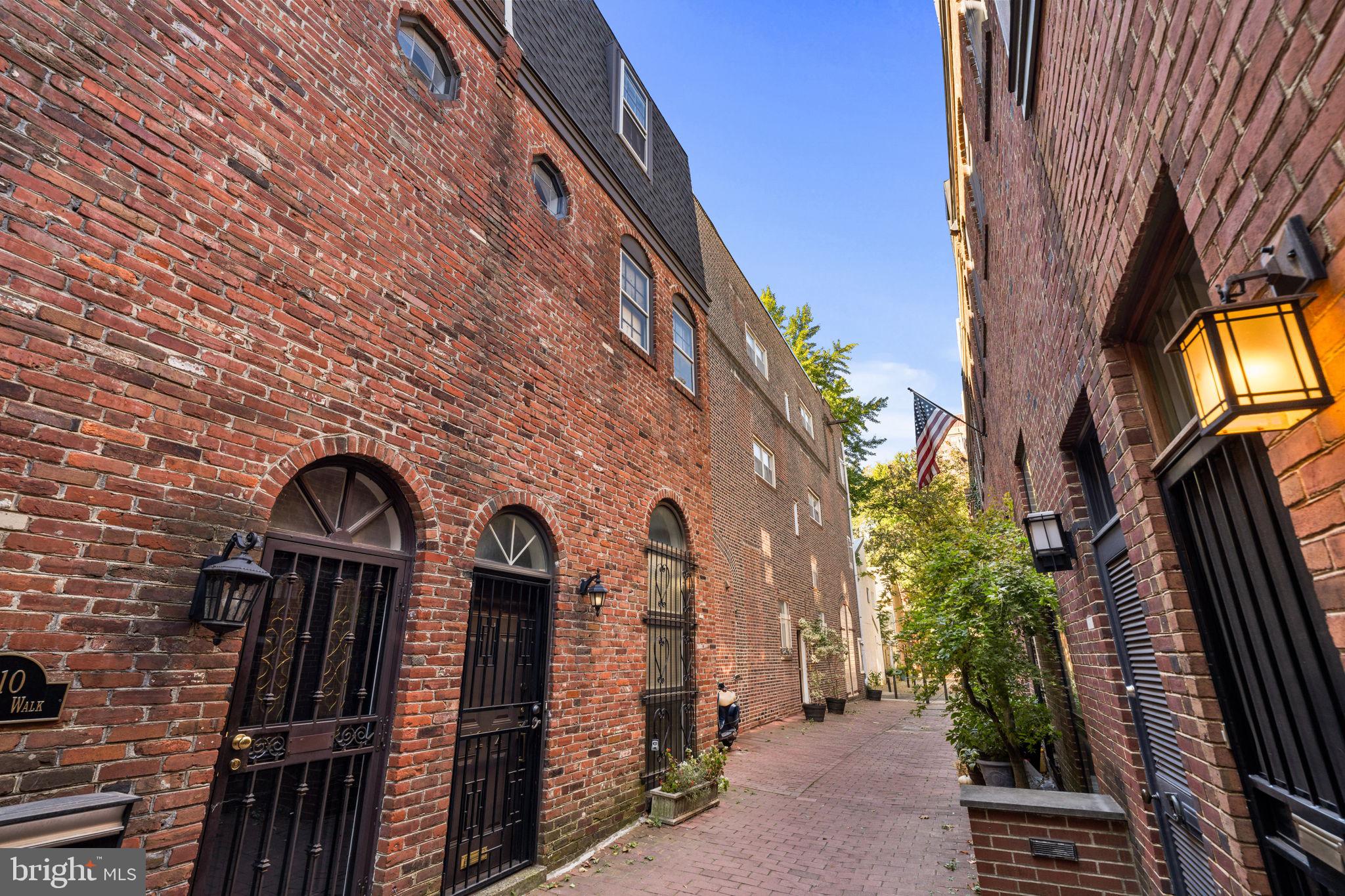 a view of a pathway along the building