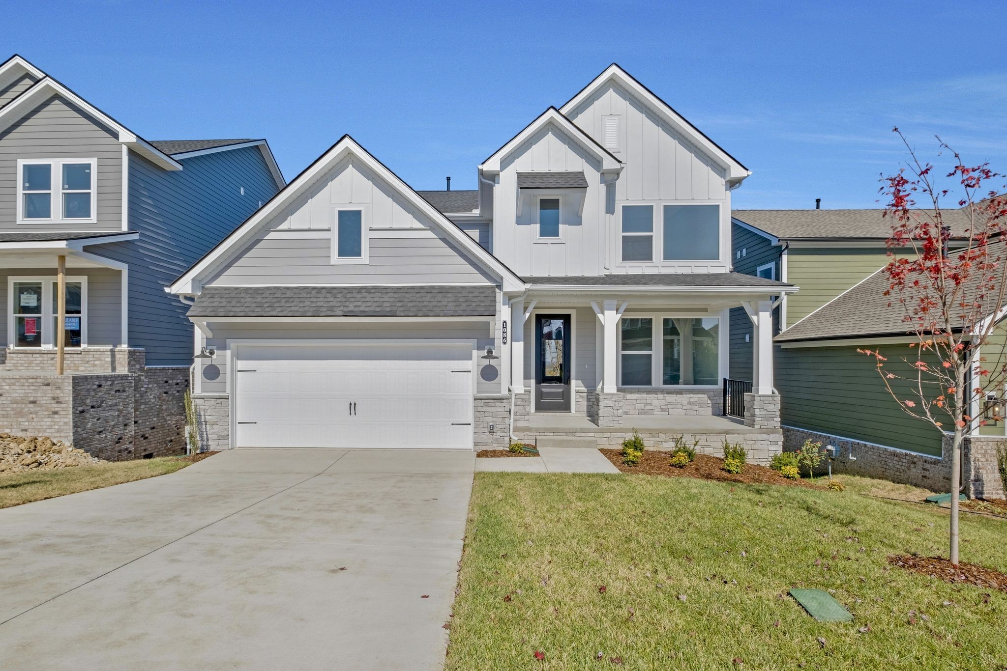 front view of a house with a yard