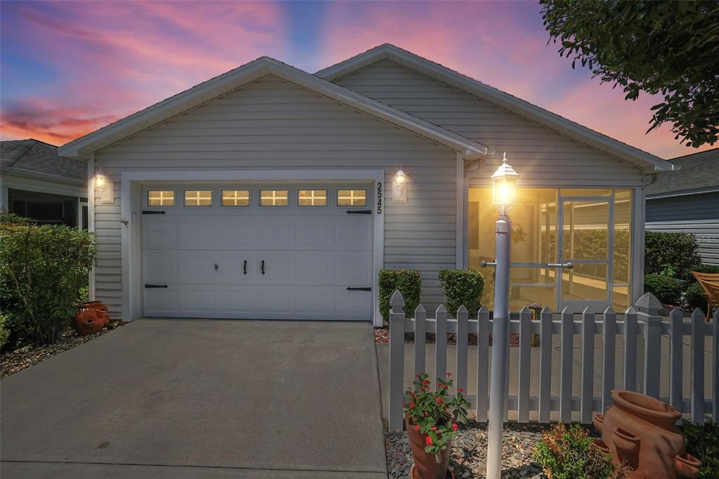 a front view of a house having yard