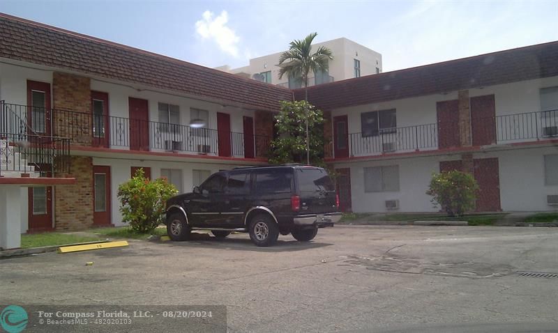 a car parked in front of a building