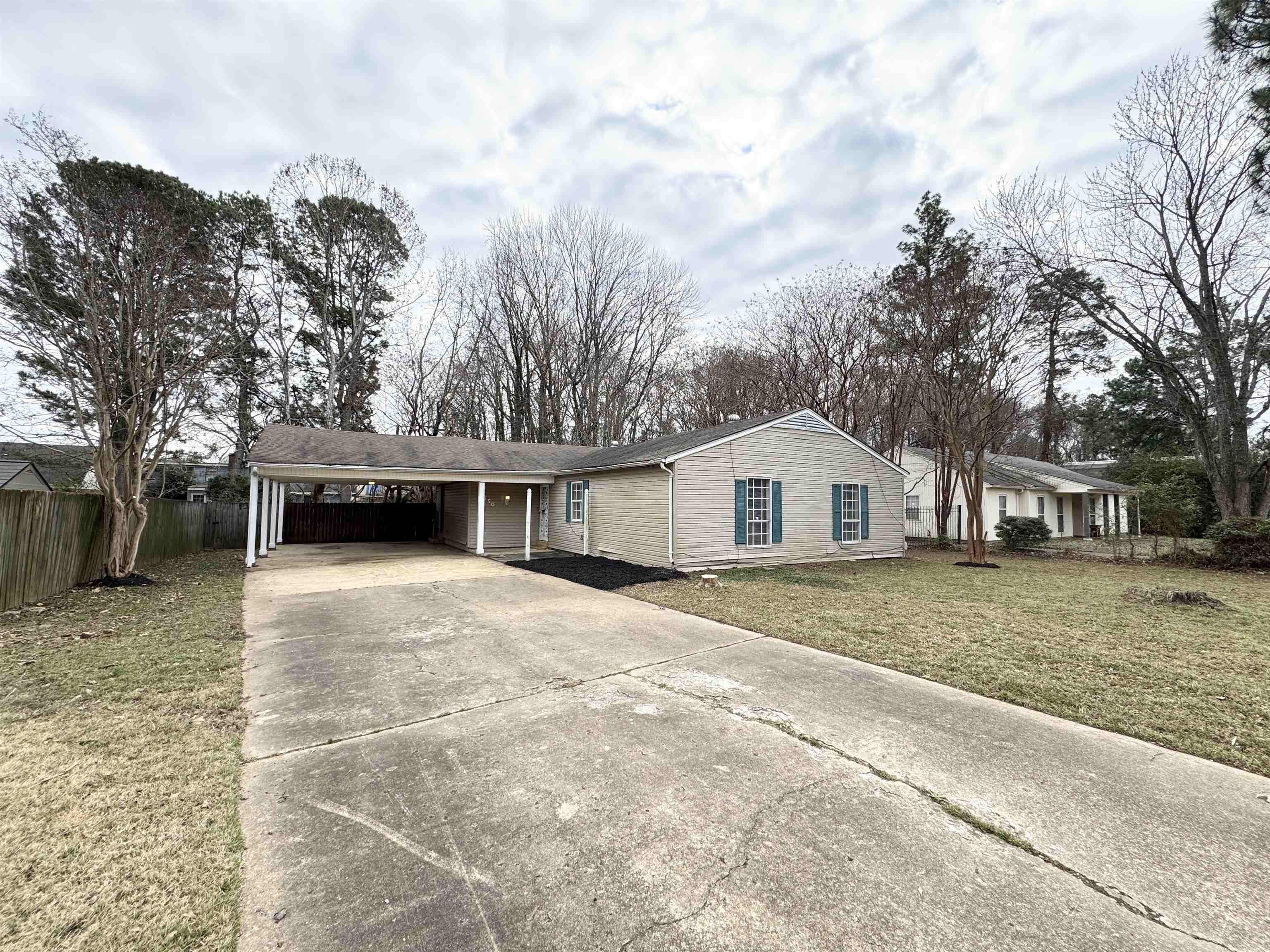 a house with trees in front of it