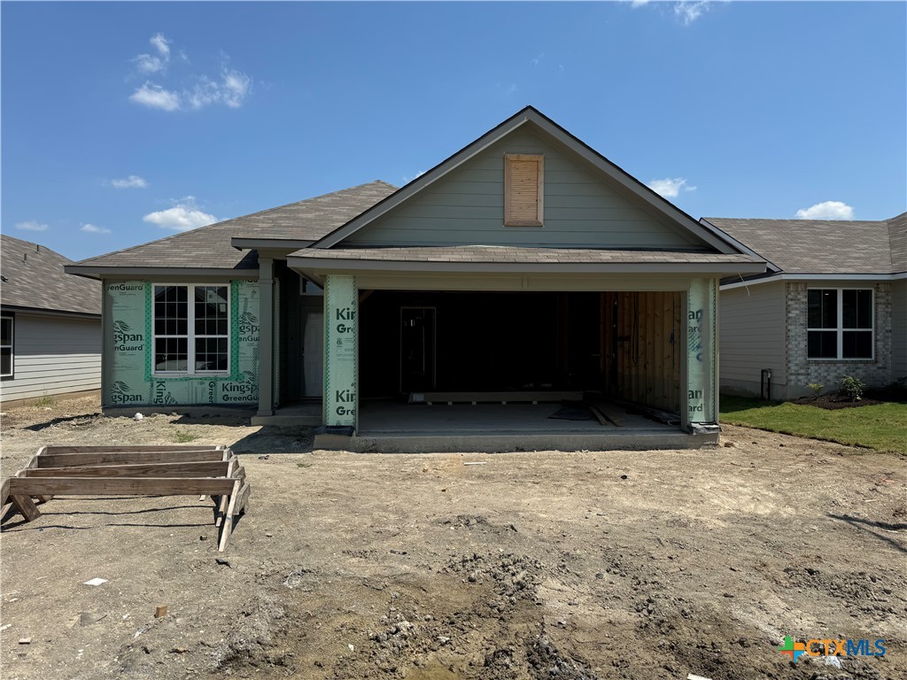 a front view of a house with garage