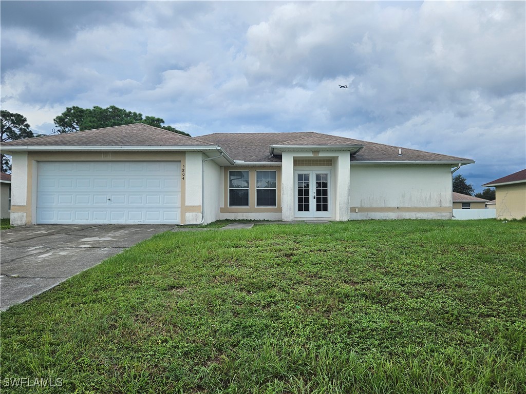 a front view of house with yard