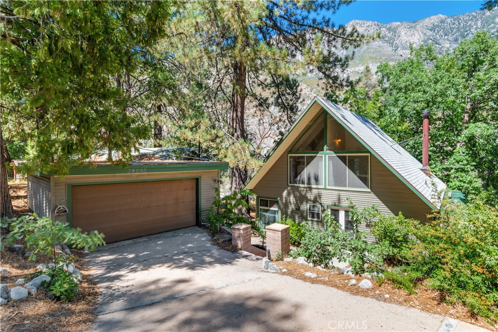 Front of house, large two-car Garage