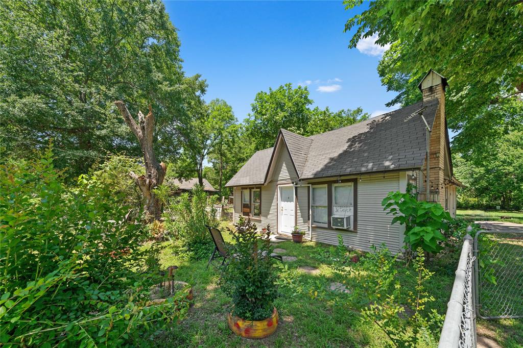 front view of a house with a small yard