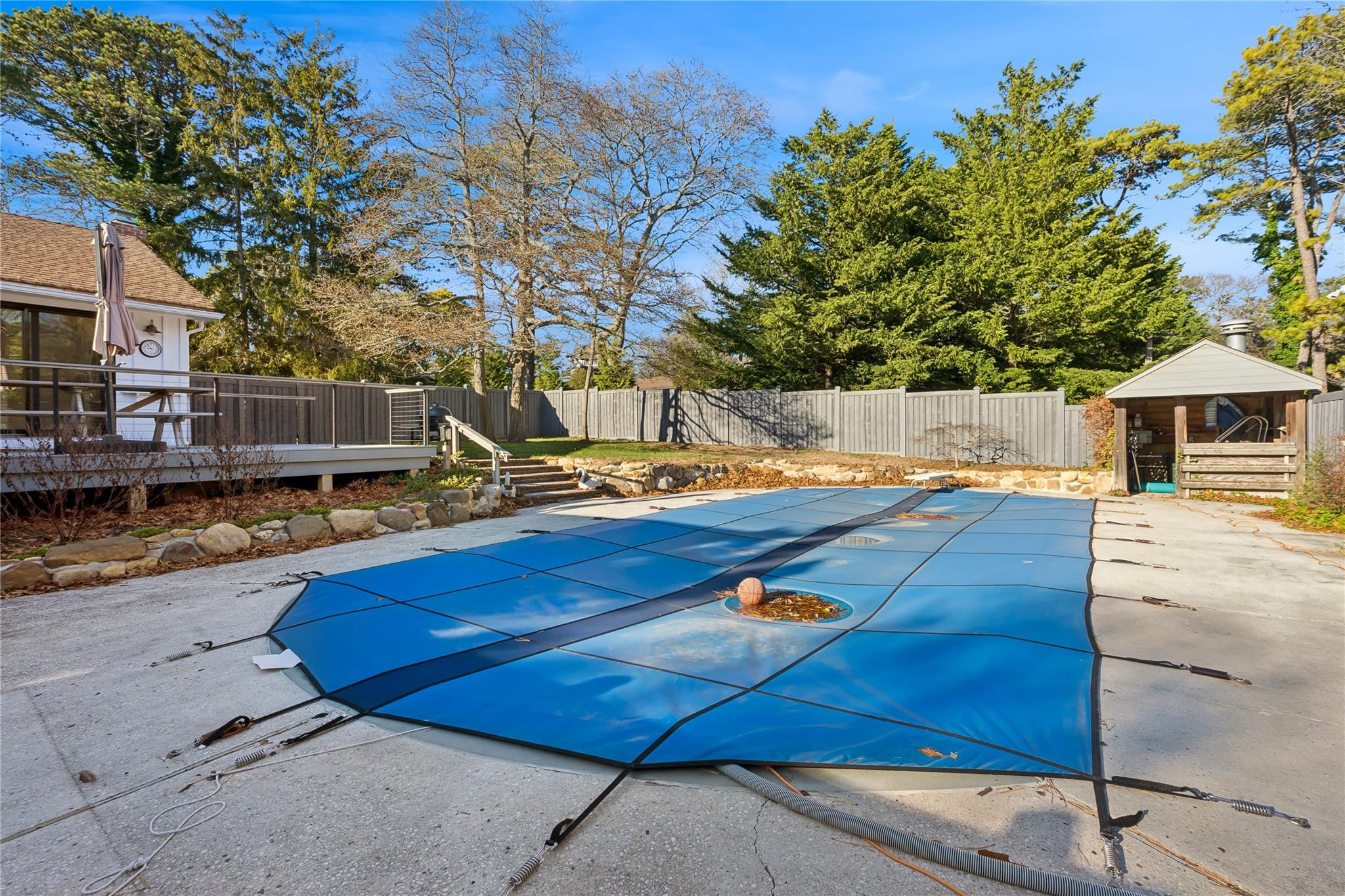 a view of a backyard with sitting area