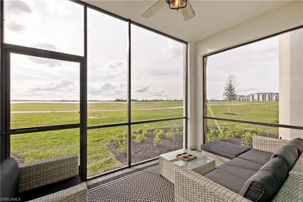 a living room with large windows