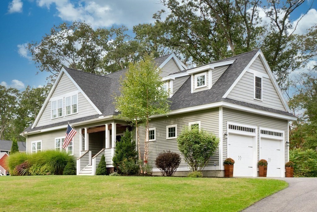 front view of a house with a yard