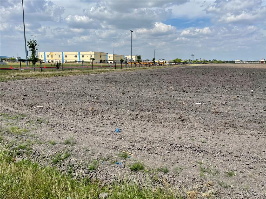 a view of a big yard with a lake