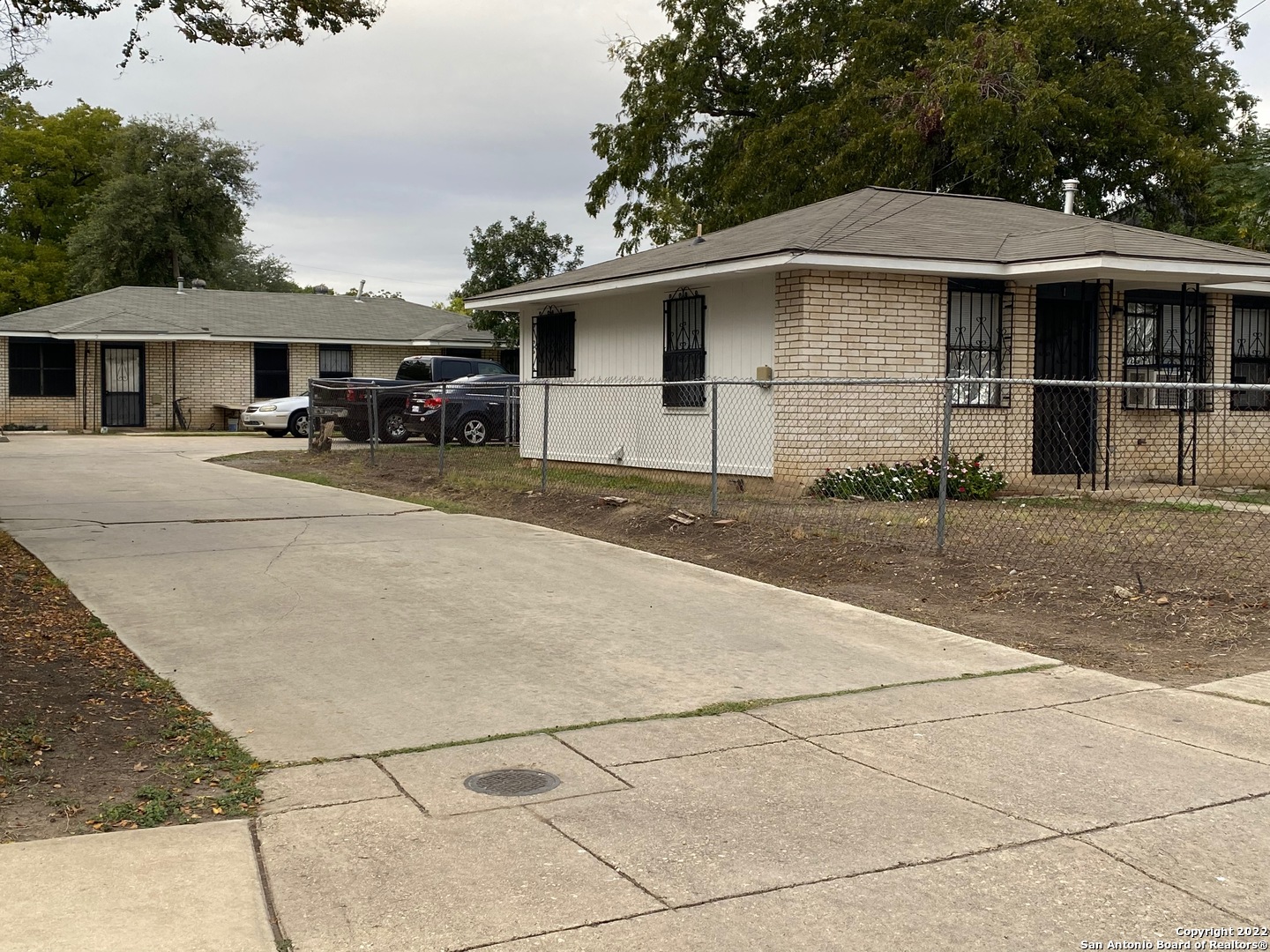 a front view of a house with yard