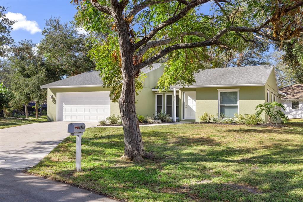 front view of a house with a yard