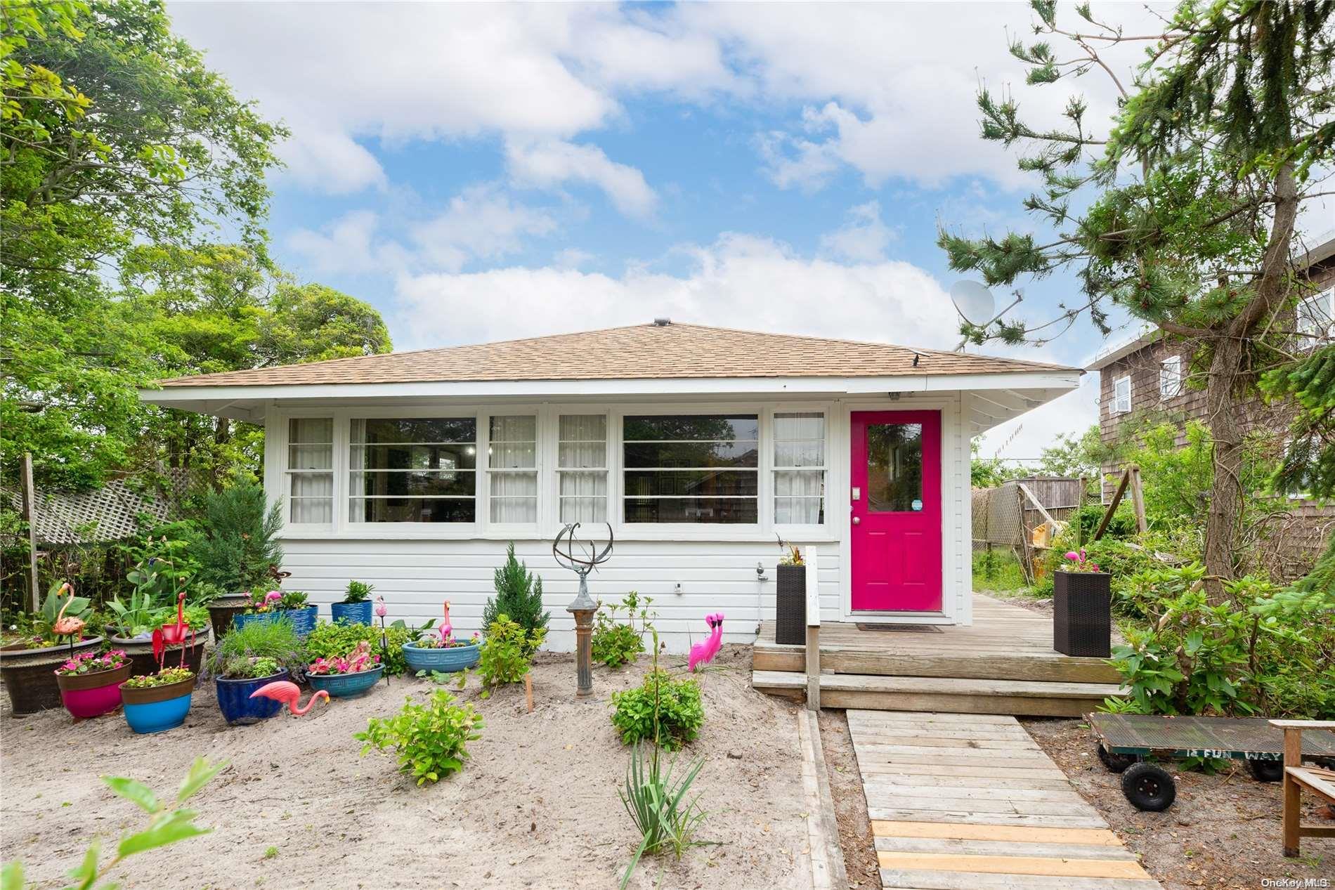 a front view of a house with an outdoor space